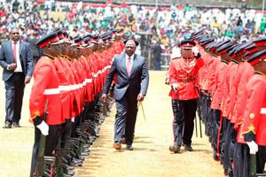 President Dr William Ruto inspects a guard of honour during the Mashuja Day celebrations