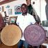 Clement Kiptoon Komen displays his items at his local artist shop in Shella, Lamu.