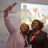 Homa Bay Governor Gladys Wanga take a photo with some Kenyans at the COP27