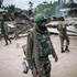 A soldier from the armed forces of the DRC on foot patrol in the village of Manzalaho near Beni. 