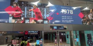 A well-illuminated billboard at the Doha Metro