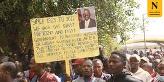 Ruto supporter placard hustler jamhuri day Nyayo Stadium