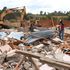 Members of the public salvage what they could after houses were demolished at Kapseret in Uasin Gishu County