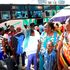 Passengers board a bus at a bus station in Mombasa