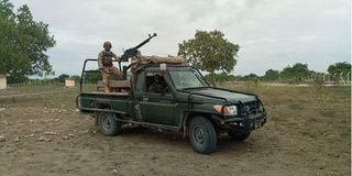Kenya Defence Forces soldiers on patrol at Kotile within Boni forest on the border of Lamu and Garissa