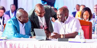 President William Ruto chats with Deputy President Rigathi Gachagua and Head of Public Service Felix Koskei