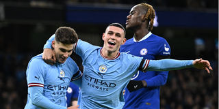 Manchester City players Alvarez and Foden celebrate