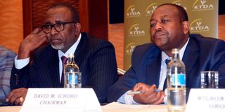 Agriculture CS Mithika Linturi (left) and KTDA chairman David Ichoho 