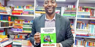 Author Alexander Nderitu with his latest book, ‘Disco Matanga.’ 