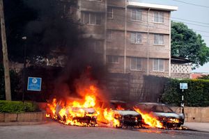 Vehicles in flames at the scene of the terror attack at Dusit D2 Hotel on January 15, 2019.