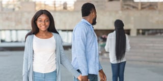 black couple man looking at other woman