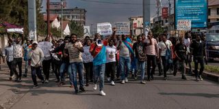 Demonstrators march during a demonstration goma drc
