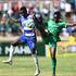 Gor Mahia’s Paul Otieno vies for the ball with Cliff Nyakeya of AFC Leopards
