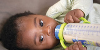 baby drinking milk bottle