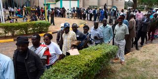 Maize farmers in Uasin Gishu County queue to buy subsidised fertiliser at the National Cereals and Produce Board Eldoret depot