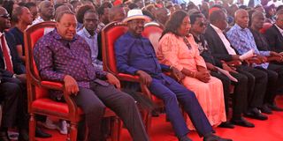 Former President Uhuru Kenyatta (left), Former Prime Minister Raila Odinga (centre) and Mama Ida Odinga