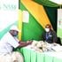 An NSSF official talks to a client at the Kenyatta International Convention Centre