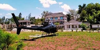 The helicopter that carried former President Uhuru Kenyatta parked on the lawns of Little Gem Resort