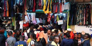 Members of the public milling around a clothing shop in Eldoret town on December 24, 2022, during the Christmas festivities