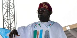 Candidate of the ruling All Progressives Congress (APC) Bola Tinubu gestures during their final campaign rally