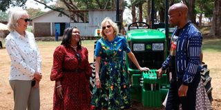 US First Lady Jill Biden (third left) laughing yesterday as she interacted with staff from Hello Tractor,