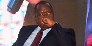 Fred Matiang'i writing letter