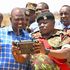 President William Ruto is shown how a drone is operated during the opening of the Border Police Hospital in Kanyonyo, Kitui