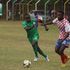 Gor Mahia defender Geoffrey Ochieng (left) vies with Nzoia Sugar midfielder Felicien Okanda