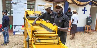 University of Eldoret students Jacob Koech and Vincent Kiplimo with their variable pitch potato grader. 
