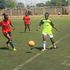 Kayole Ladies midfielder Dima Halima (left) vies for the ball with Falling Waters Barcelona striker Naomi Masinde