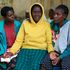 Ms Everline Miruka (centre) is consoled by relatives at the Coptic Hospital mortuary in Maseno, Kisumu County