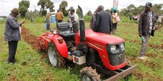 Farmers learn how to use a modern potato-harvesting machine at Baraka Agricultural Training College in Molo, Nakuru County