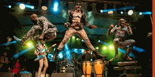 Members of Sauti Sol during a past live performance on stage.