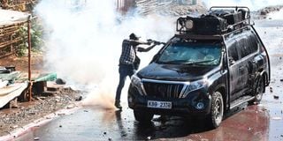 The Kamukunji police station-based officer firing at a car that had journalists.