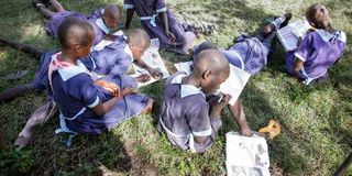 Pupils of Mboto Sunrise primary school do their CBC assignment
