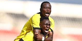 Tusker midfielder Shaphan Siwa (right) celebrates with team mate Eric Otieno