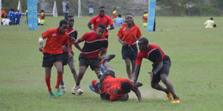 Action between Thika KMTC and Gatundu KMTC in rugby sevens match