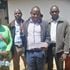Sirikwa Squatters chairman Benjamin Rono (centre) accompanied by members speaking in Eldoret