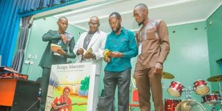 Guest of honour Kisumu Governor Prof Anyang Nyongo, with authors of the book "Benga Maestro: The Life & Genius of Dr Osito