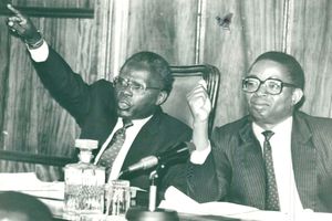 Then-Commissioner Justice Richard Otieno Kwach (left) and the Ouko Judicial Commission of Inquiry chairman, Mr Evans Gicheru