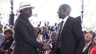 President William Ruto shakes hands with former Prime Minister Raila Odinga on Saturday, May 13, 2023.