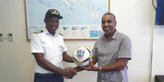 Kenya Ports Authority managing director Captain William Ruto (left) with football administrator Twaha Mbarak 