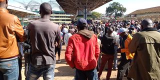 A crowd in Kitale town following a clash between bodaboda riders and matatu touts early Tuesday morning