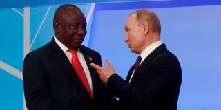 South African President Cyril Ramaphosa (left) greets Russian President Vladimir Putin during the 2019 Russia-Africa Summit 