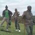 Men armed with bows and arrows stand guard in their village in Pimbinyiet, Narok County
