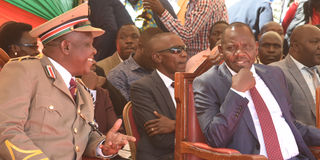 Uasin Gishu County Governor Jonathan Bii and County Commissioner Edison Nyale (left), during the Madaraka Day celebrations