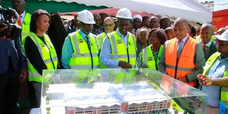 President William Ruto views a market model as he launched the construction of the Embu modern market 