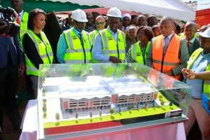 President William Ruto views a market model as he launched the construction of the Embu modern market 