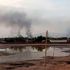 Smoke billows in the distance amid ongoing fighting in Khartoum