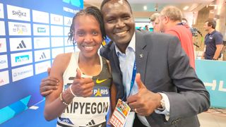 Kenya's Faith Kipyegon poses for a photo with National Olympic Committtee of Kenya (NOC-K) President Paul Tergat 
